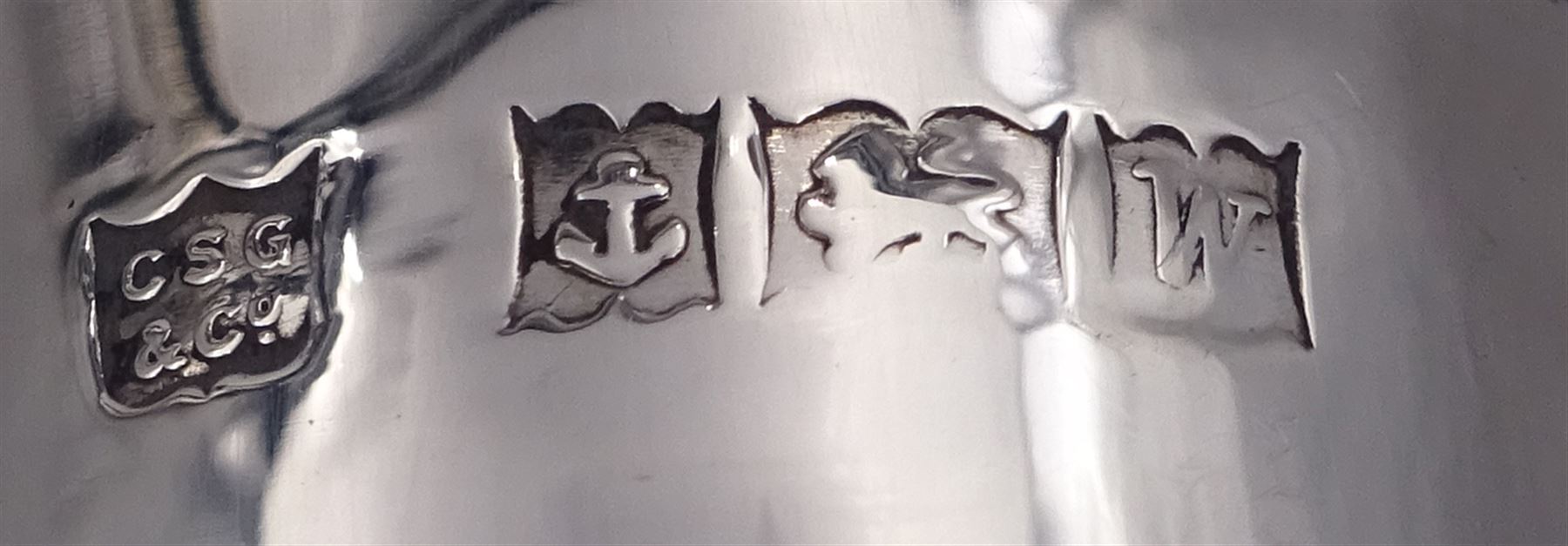 Pair of modern silver trumpet vases, each with fluted rim, upon tapering stem and slightly domed weighted circular foot, hallmarked Charles S Green & Co Ltd, Birmingham 1971, H20cm