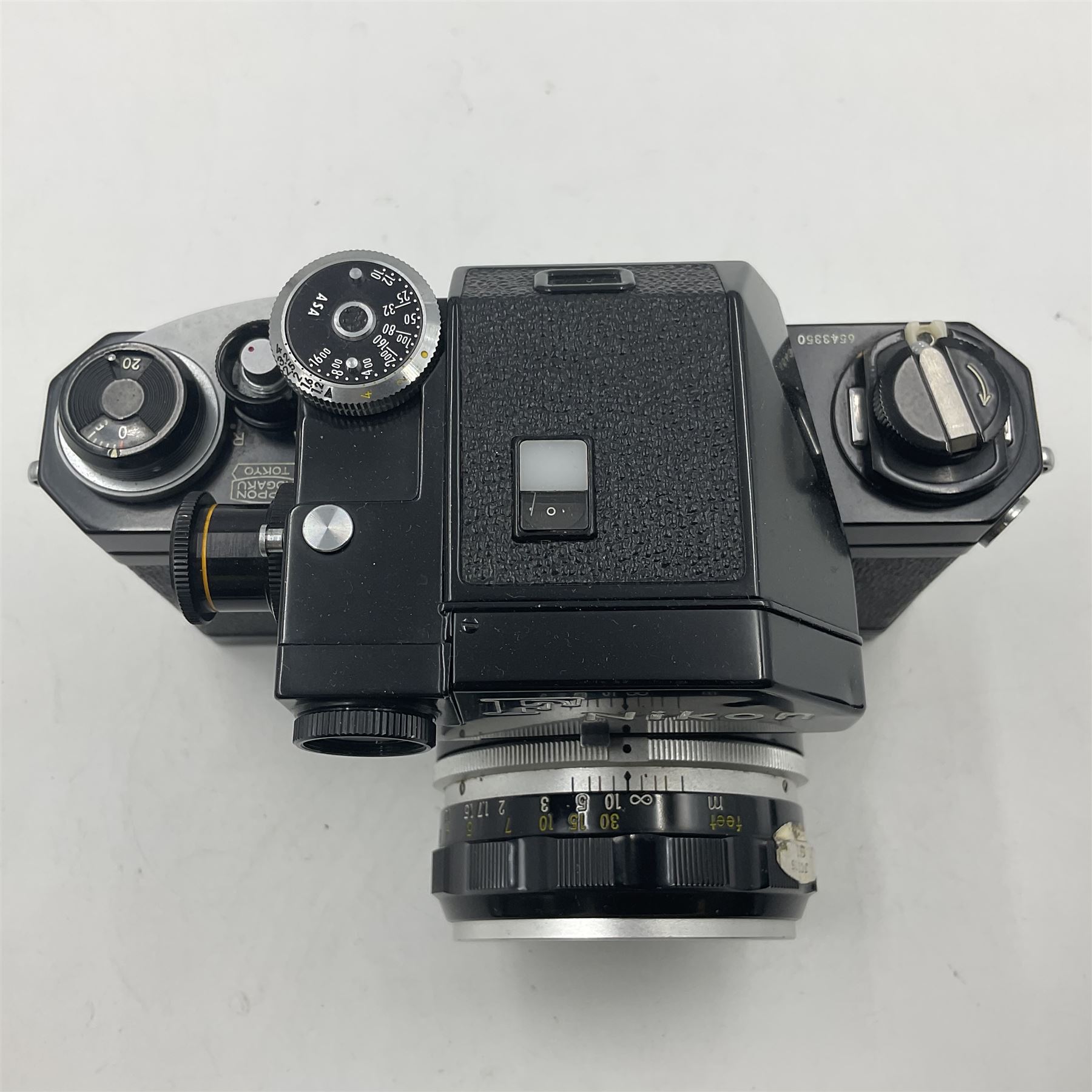 Nikon F Photomic camera body, serial no. 6543350, circa 1964, with 'Nikon NIKKOR-H Auto 1:2 f=50mm' lens, serial no. 1002112