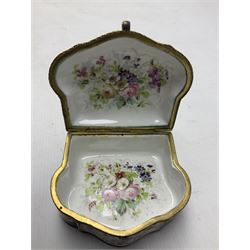 Sevres style late 19th/early 20th century trinket box decorated in the rococo style, the shaped cover painted with an 18th century courting couple in a garden scene opening to reveal the interior painted with floral sprays, the conforming body with a painted panel of floral decoration, all reserved upon cobalt blue ground with foliate gilt borders, with interlaced L's mark beneath, L12cm H6cm