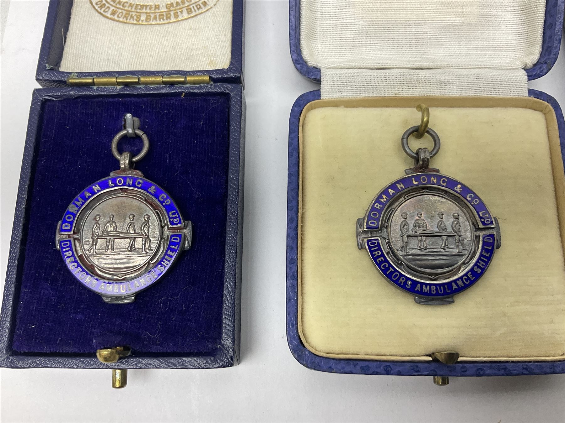 Four St John's silver fobs, together with two silver Directors Ambulance shield fobs and two other St Johns items 