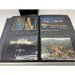 Four modern albums containing approximately eight-hundred and fifty Edwardian and later postcards including real photographic and printed topographical, novelty leather and wooden cards, applique etc