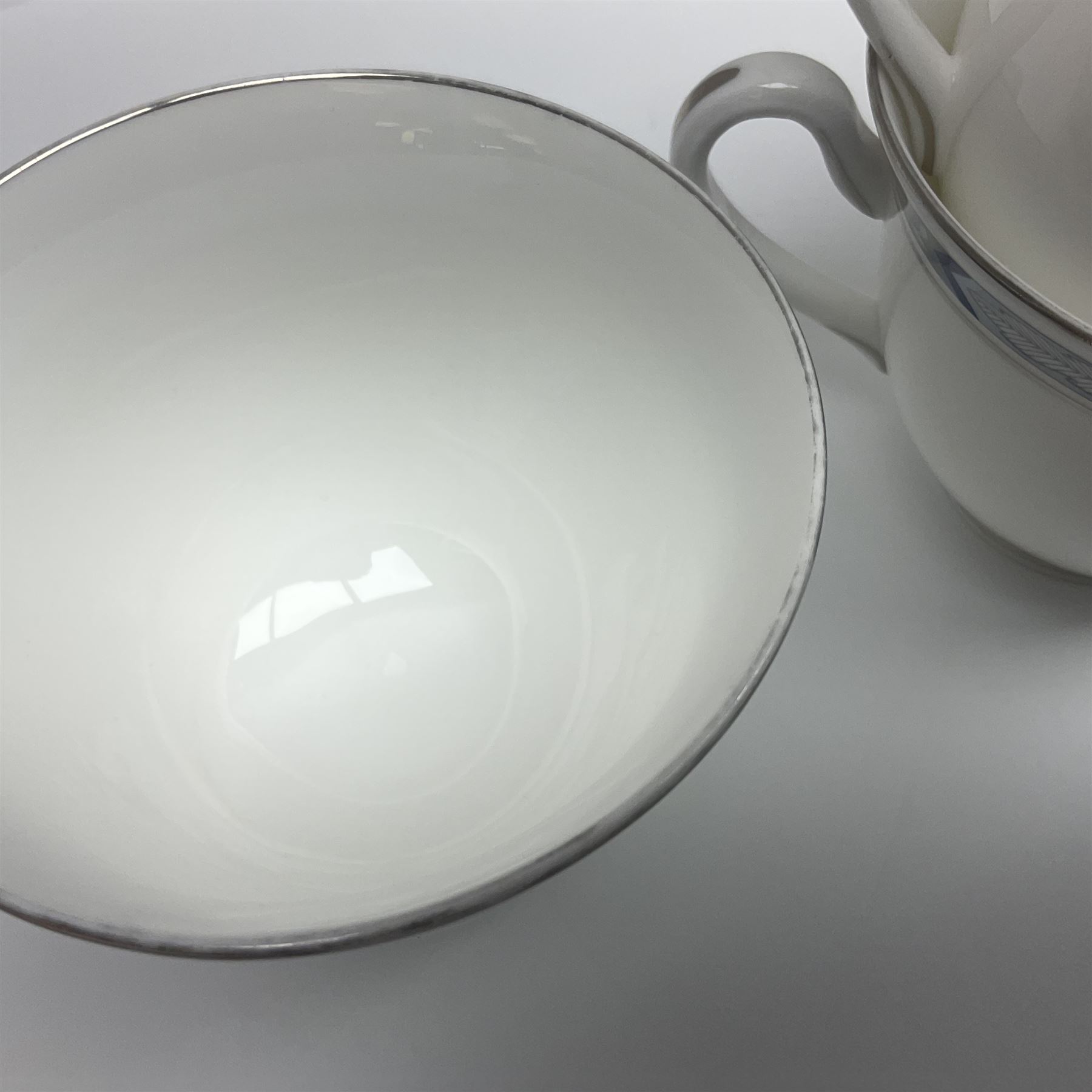 Royal Worcester Beaufort tea service, comprising teapot, milk jug, open saucier, eleven teacups, twelve saucers, eight dessert plates and one cake plate