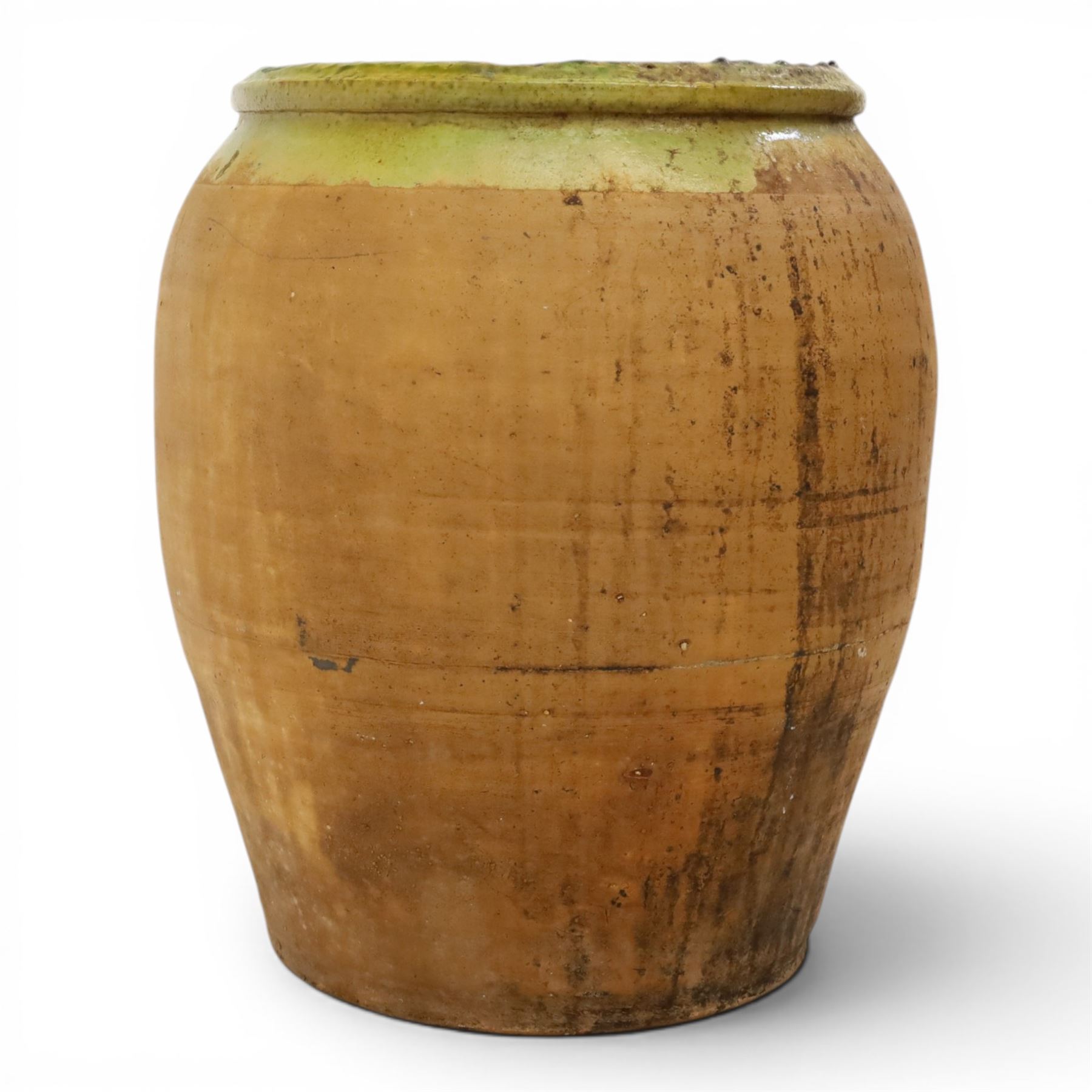 Large Continental terracotta olive jar, of typical baluster form with a green glaze band decoration, H46cm