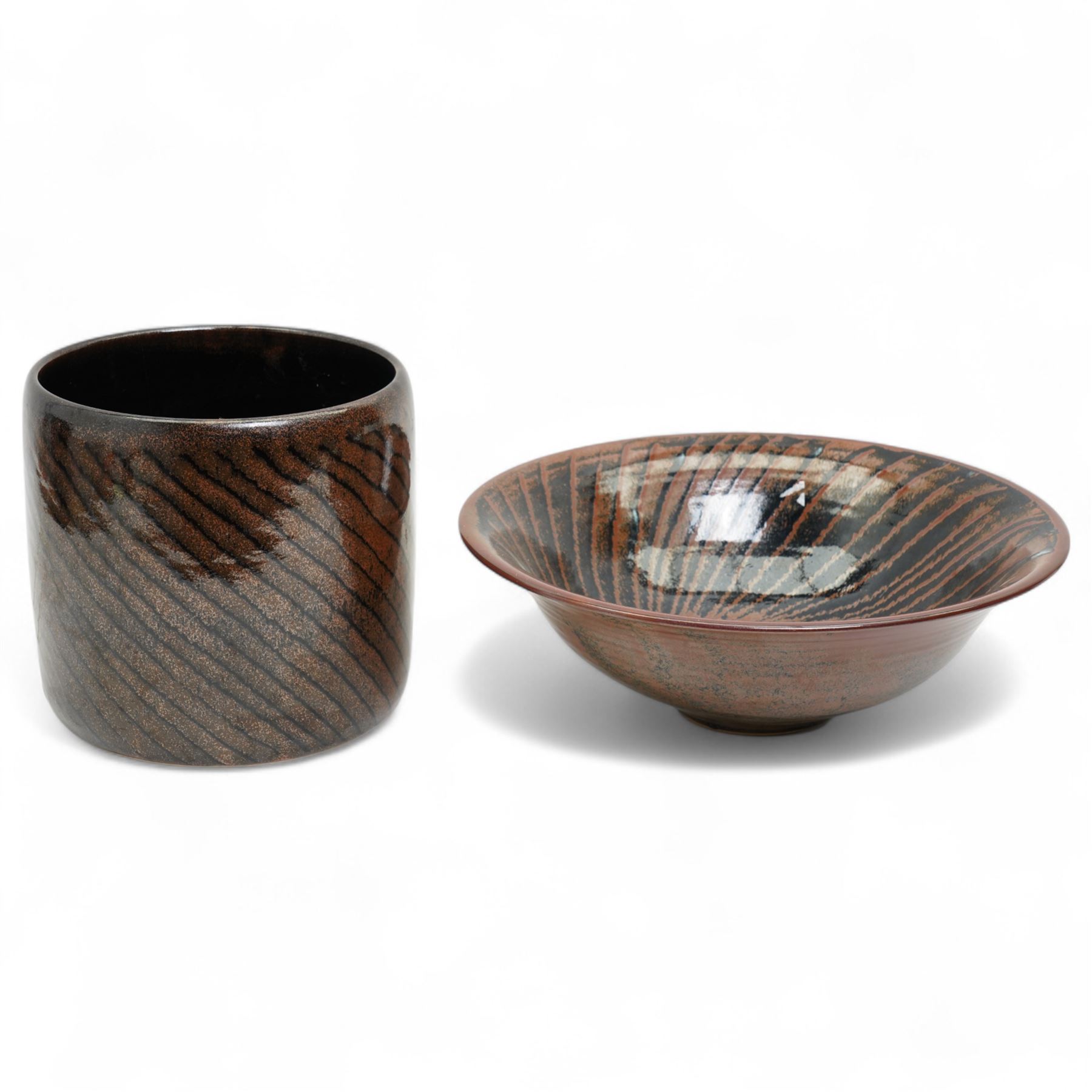 Andrew Crouch (British 1955); large studio pottery bowl and similarly patterned planter, in shades of black and brown, planter H22cm bowl D37c m (2)