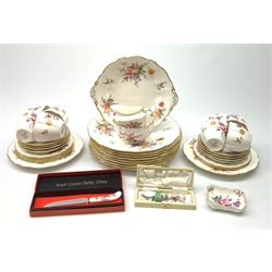 A selection of Royal Crown Derby Derby Posies pattern dinner and tea wares, comprising eight dinner plates, two salad plates, a sandwich plate, six side plates, eight teacups and eight saucers, milk jug, open sucrier, pin dish, and two boxed knifes. 