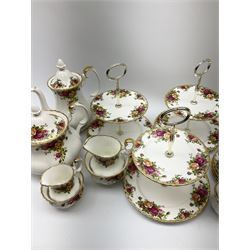 Royal Albert Old Country Roses teawares and cake stands, comprising tea pot, six tea cups and saucers, coffee pot, six coffee cups and saucers, milk jug, cream jug and two sugar bowls, three tier cake stands and  twelve side plates. 