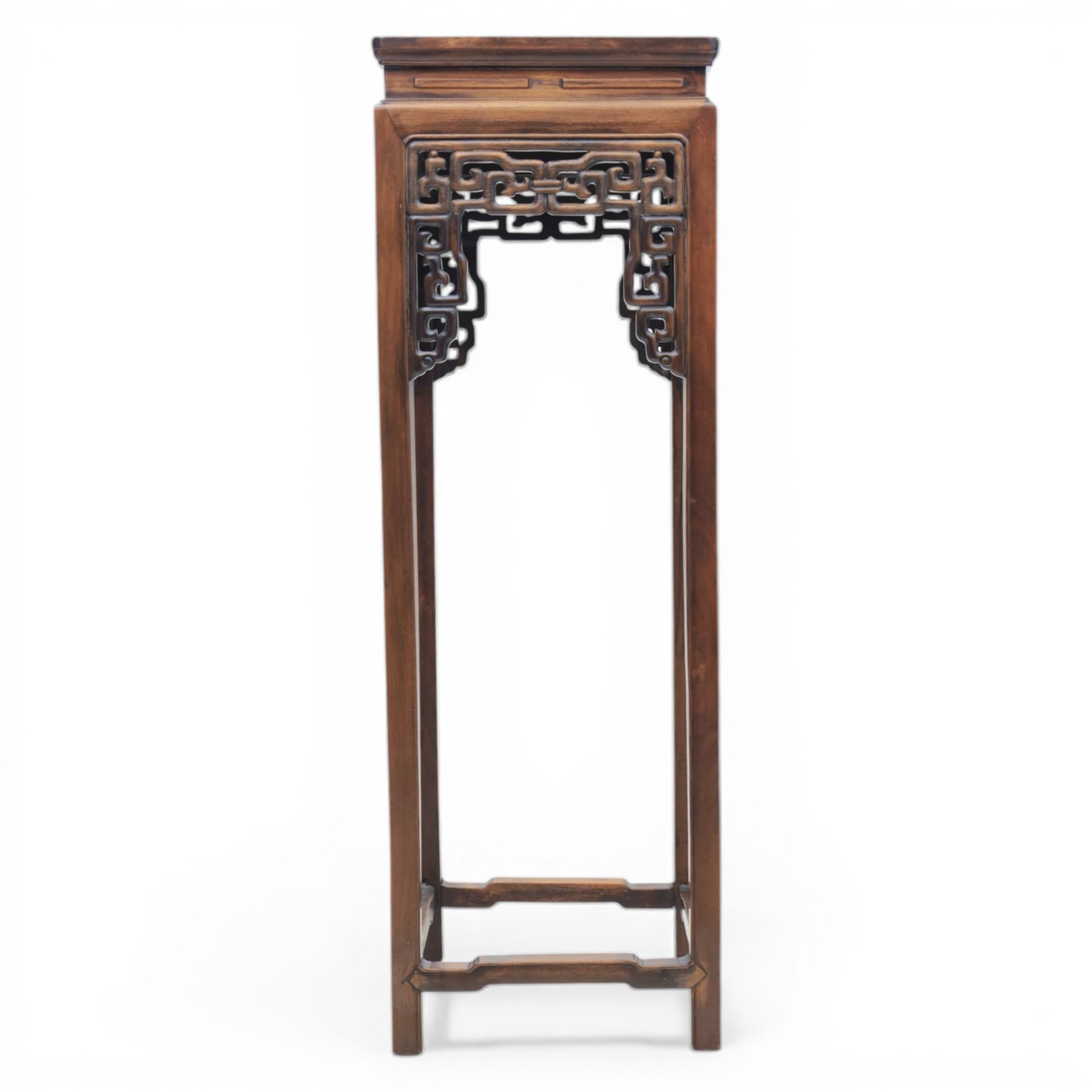 Chinese style hardwood open latticework plantstand, square top ove latticework spandrels raised on square supports united by stretchers