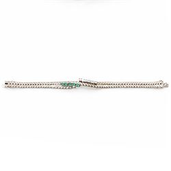 14ct white gold diamond and emerald crossover bracelet, the central section set with five graduating round brilliant cut diamonds and five emeralds, to a chevron link bracelet, stamped 585, total diamond weight 0.35 carat