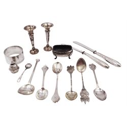 Group of silver, to include pair of miniature modern trumpet vases, hallmarked Sanders & Mackenzie, Birmingham 1962, together with a pair of trifid pattern spoons with rattail bowls, hallmarked Z Barraclough & Sons, London 1913, napkin ring, modern seal top spoon, pair of silver handled butter knives etc