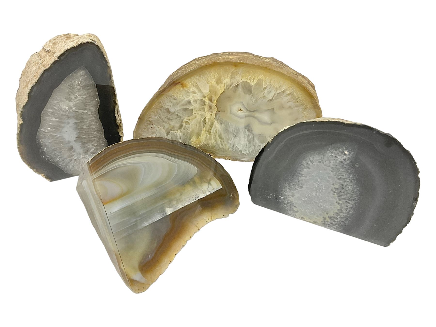 Four polished blue agate geodes, largest H10cm, L18cm