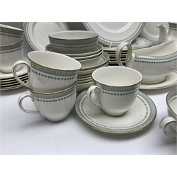 Royal Doulton Berkshire pattern part tea and dinner service, comprising ten dinner plates, six side plates, six dessert plates, six twin handled soup bowls, six bowls, three smaller bowls, sauce boat and saucer, six teacups, eight saucers, milk jug, sugar bowl and teapot, all with printed marks beneath