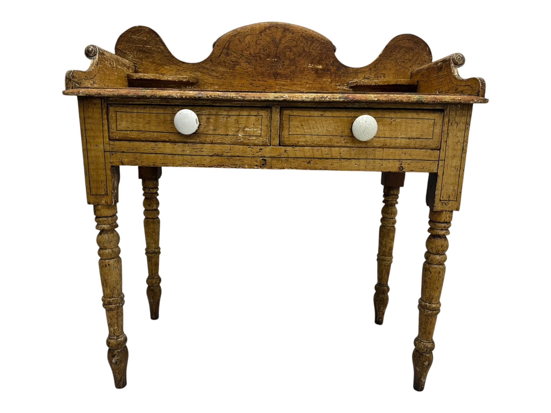 Victorian scumbled pine dressing table, rectangular top with shaped and scrolled gallery back, fitted with two drawers with ceramic knobs, on turned supports