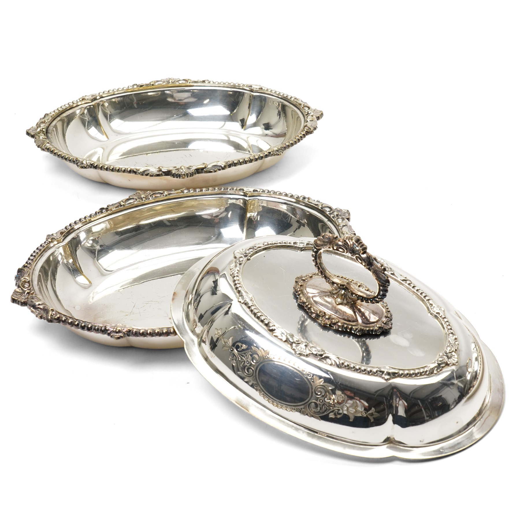 Pair of silver plated oval entree dishes and covers with bead edge and shell moulded borders and engraved covers and matching chafing dish by Martin Hall & Co and a plated meat cover