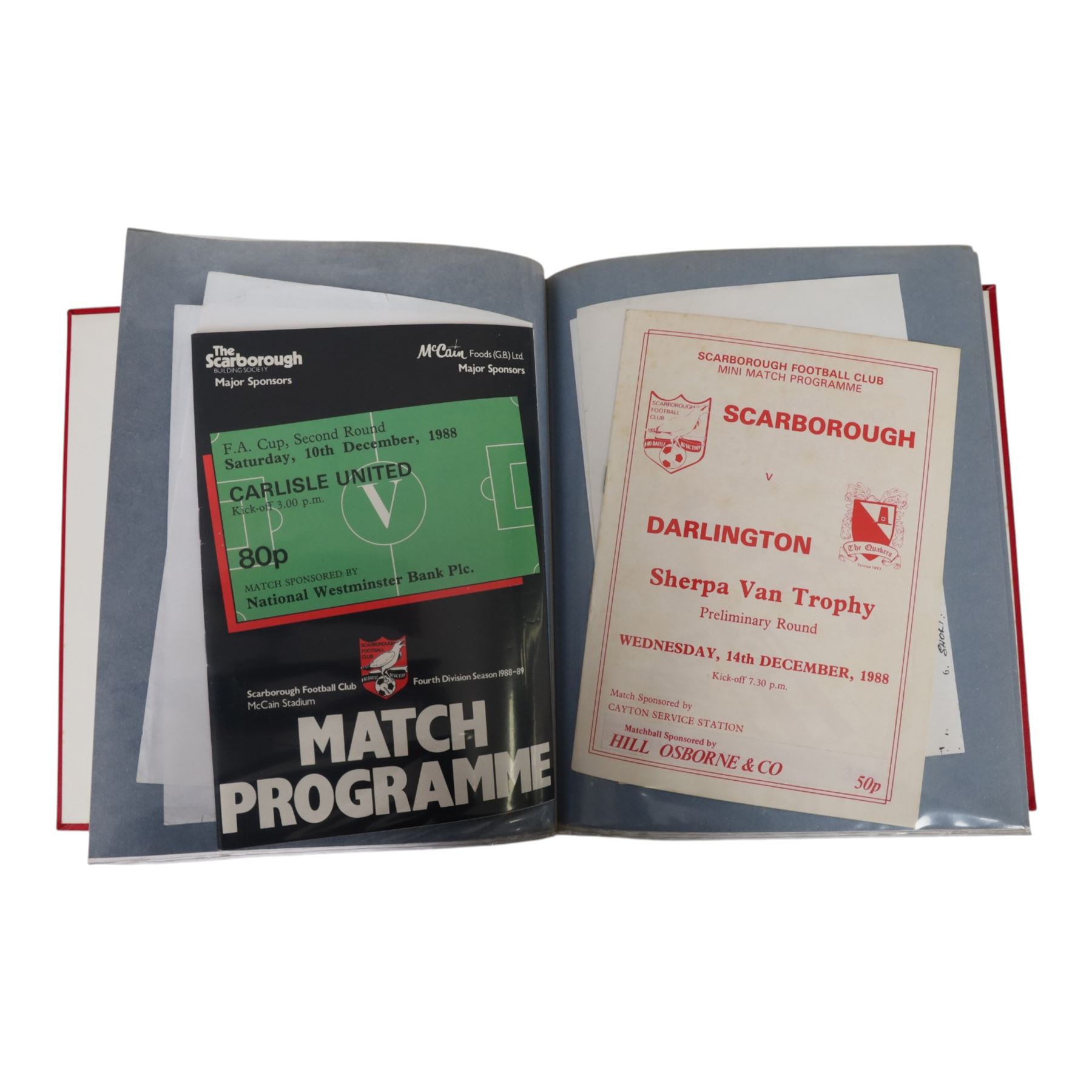 Comprehensive collection of approximately one-hundred and ninety Scarborough FC football programmes for the 1979/80, 1980/81 and 1981/82, 1982/83 seasons, all filed within eight dedicated Scarborough FC red Home and Away binders