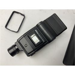 Nikon F3 SLR camera, serial number 1583609; Nikon 50mm 1:1.8 lens; Nikon 28-85mm 1:3.5-4.5 zoom lens; Vivitar MC 2X-3 Tele Converter, and a Nikon Speedlight SB-16 flash