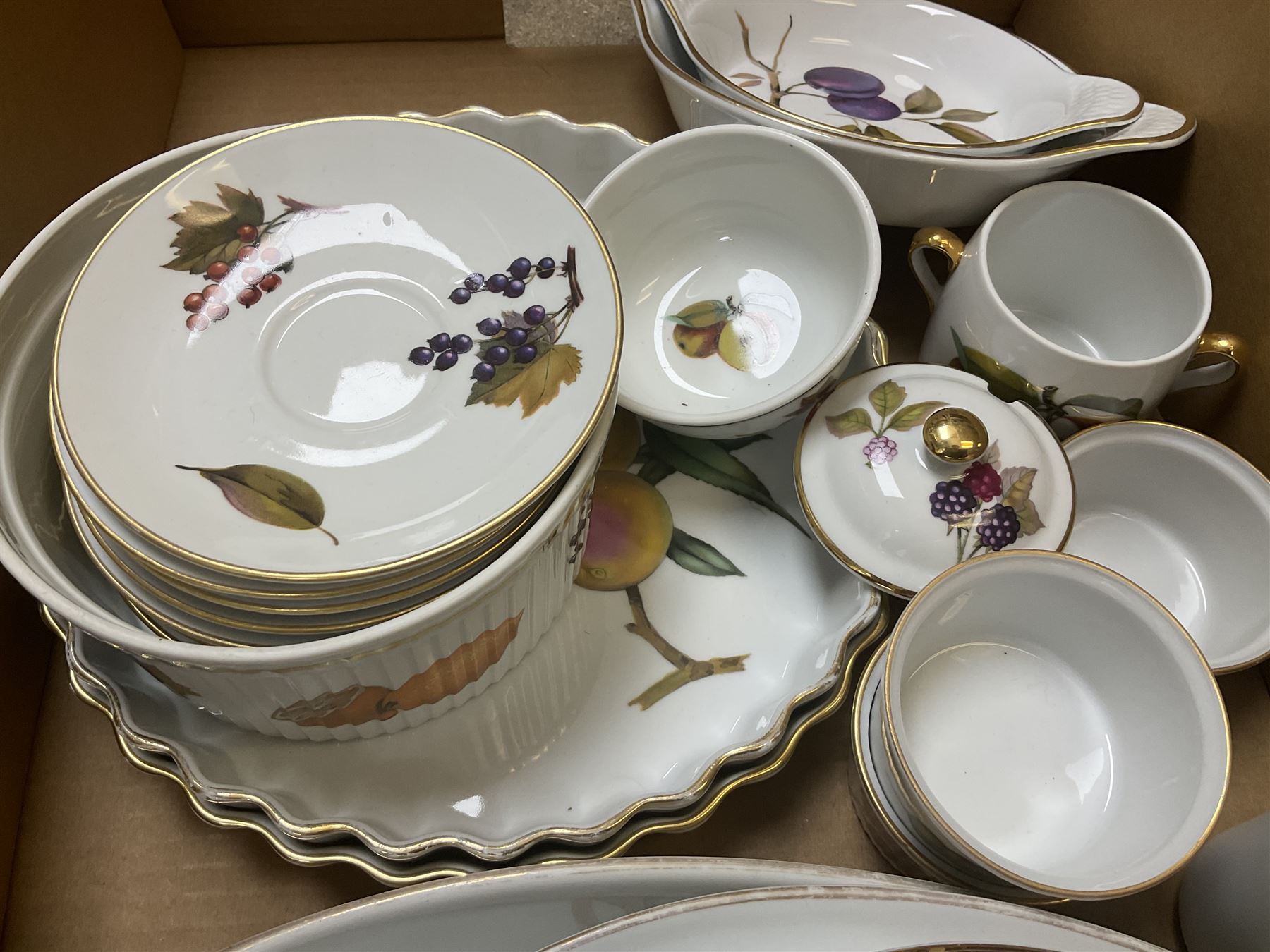 Royal Worcester Evesham and Evesham Vale tea and dinner wares, to include, three large covered tureens, coffee pot, eight tea cups and saucers, milk jug, two covered sucriers, boxed serving spoons etc, approx .130