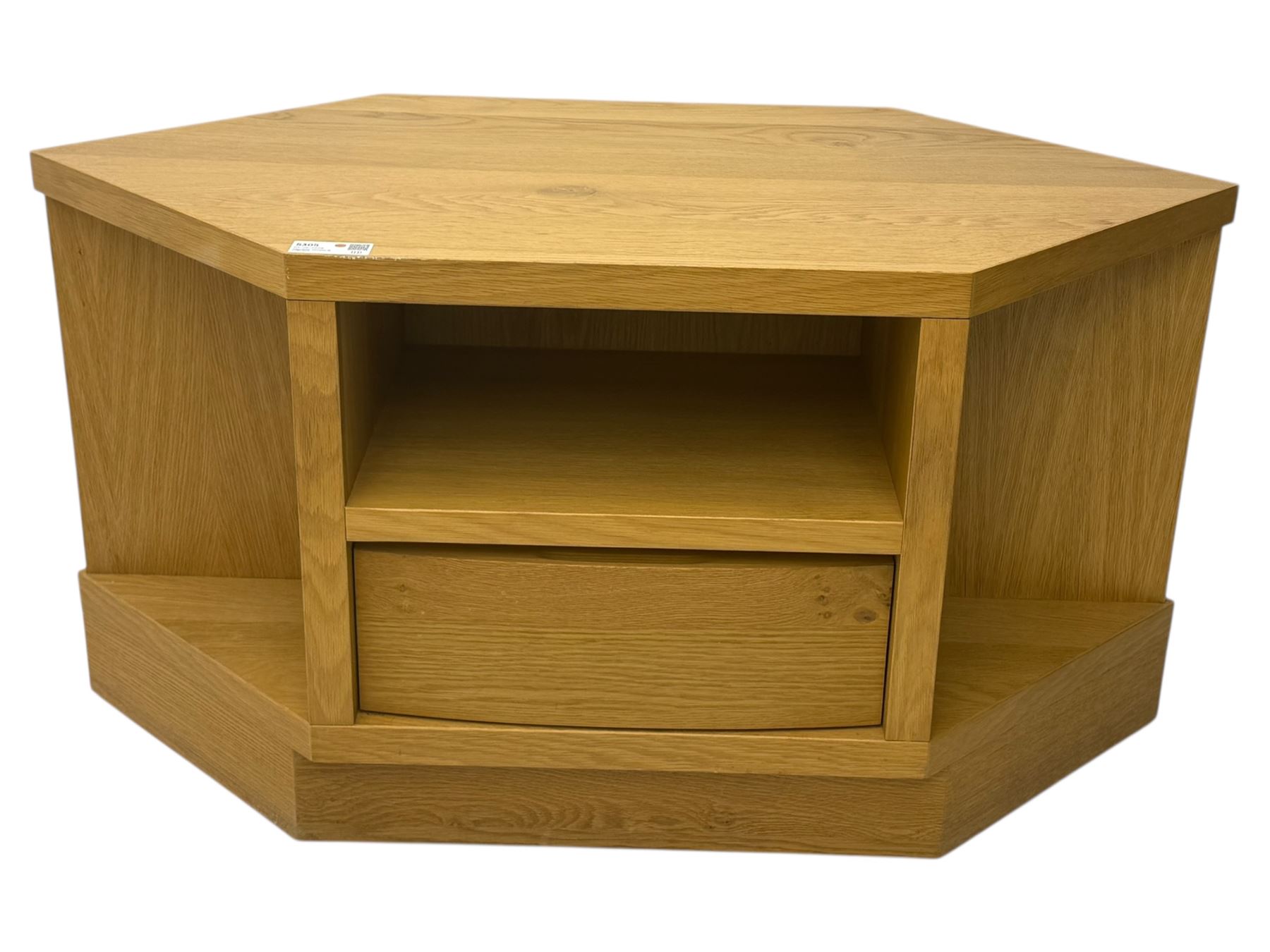 Contemporary light oak corner television stand, hexagonal top with central open section and lower drawer, shaped sides on integral plinth