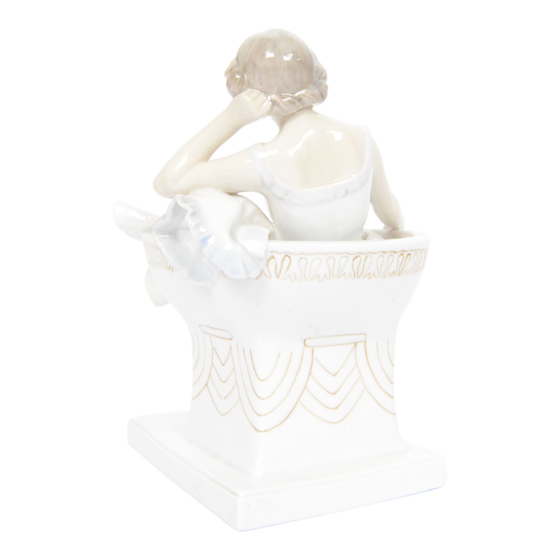 Royal Copenhagen figure no. 894, Woman Seated in a Chair, designed by Axel Locher, H20cm