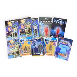 Nine TV & Film figures, comprising Neca 20th Anniversary Disney's Tron Sark, Tomy Disney's...
