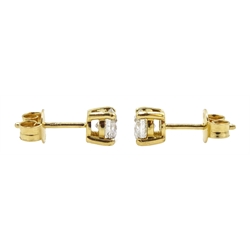 Pair of 18ct gold diamond stud earrings, stamped 750, diamond total weight 1.00 carat
