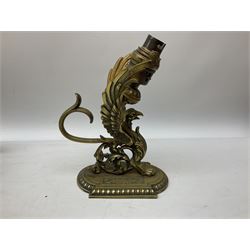 Group of metal ware, to include a brass table lamp modelled as a zoomorphic creature, pair of brass figural candlesticks, pair of brass urns, etc., in one box 