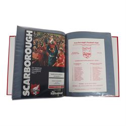 Comprehensive collection of approximately one-hundred and ninety Scarborough FC football programmes for the 1987/88, 1988/89 and 1990/91 seasons, all filed within six dedicated Scarborough FC red Home and Away binders 