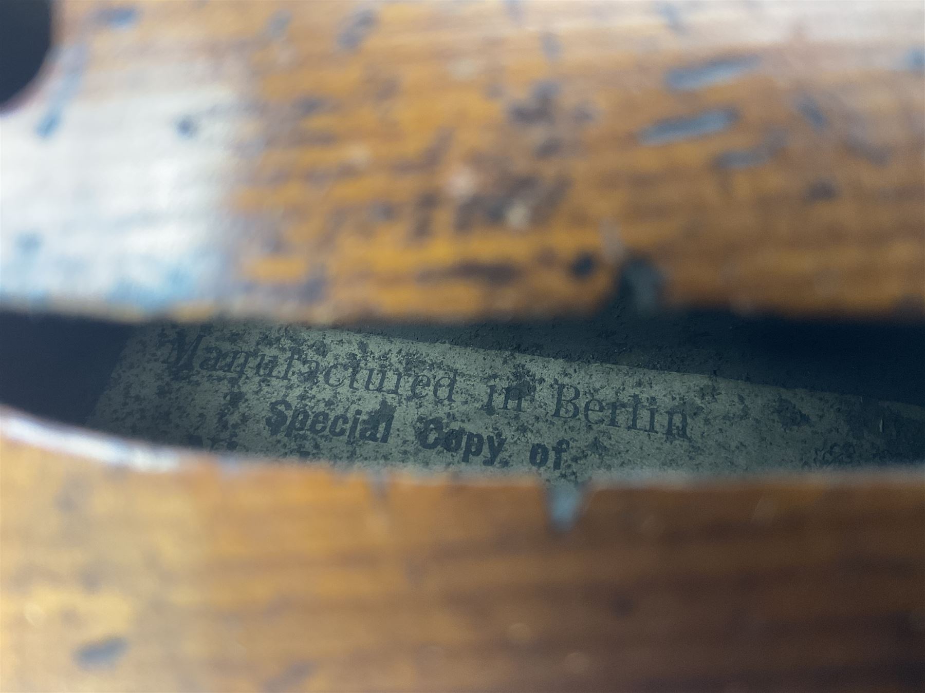 Late 19th century German trade violin c1890 with 36cm two-piece birds-eye maple back, neck and ribs and spruce top; bears label 'Manufactured in Berlin Special Copy of Nicolaus Amati' L59.5cm; in carrying case