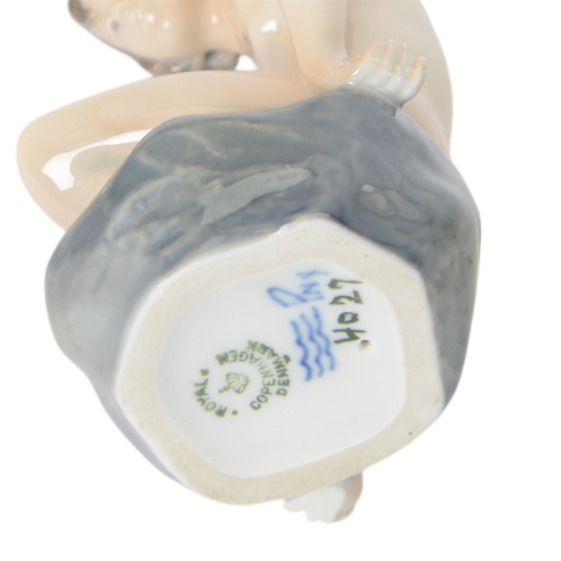 Royal Copenhagen Figure The Little Mermaid no. 4431 together with two Girl on Stone no . 4027  