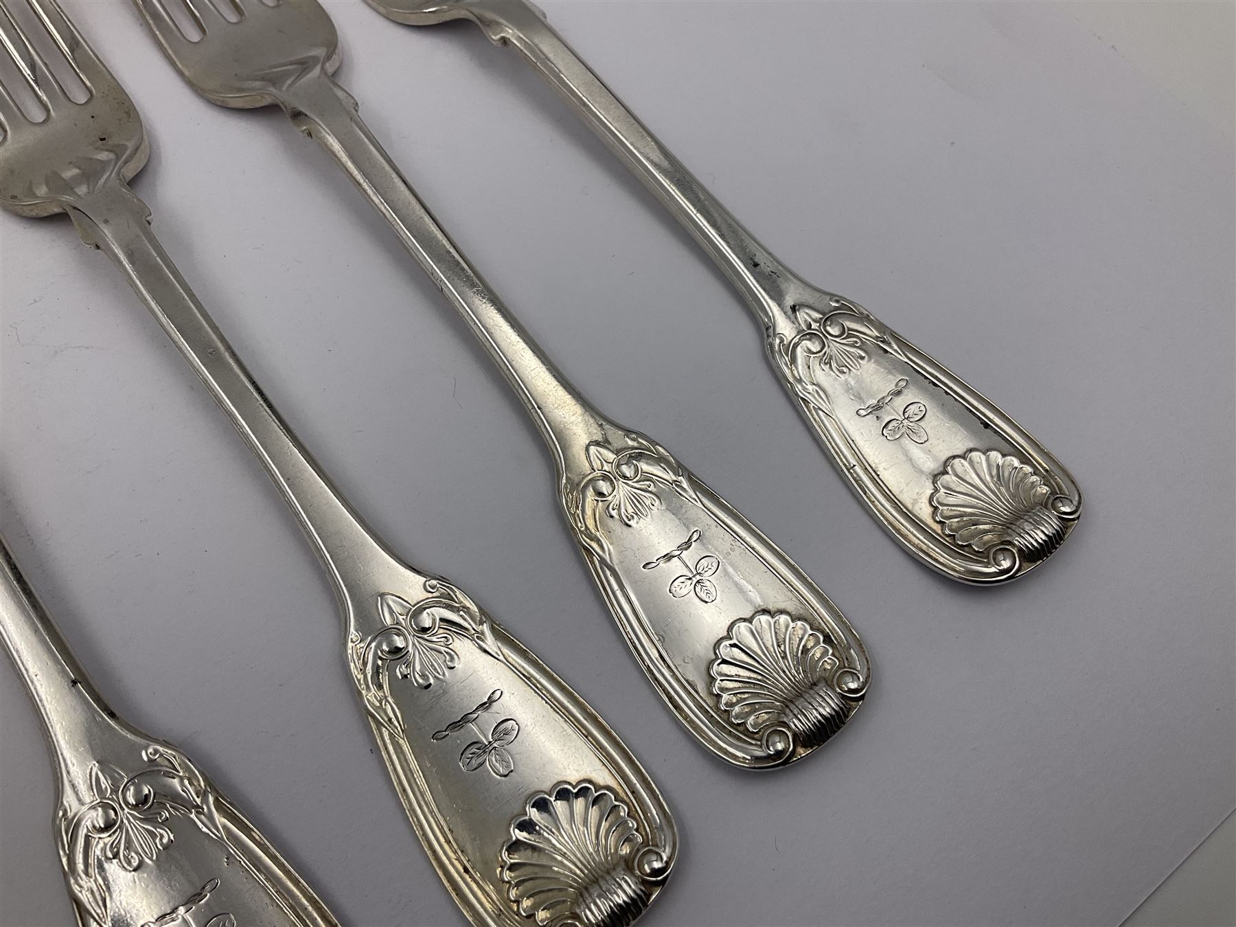 George IV Scottish silver Kings pattern cutlery for six place settings, to include table spoons, table forks, dessert spoons and dessert forks, all engraved with shamrock crest to terminal, hallmarked Robert Gray & Son, Glasgow 1833