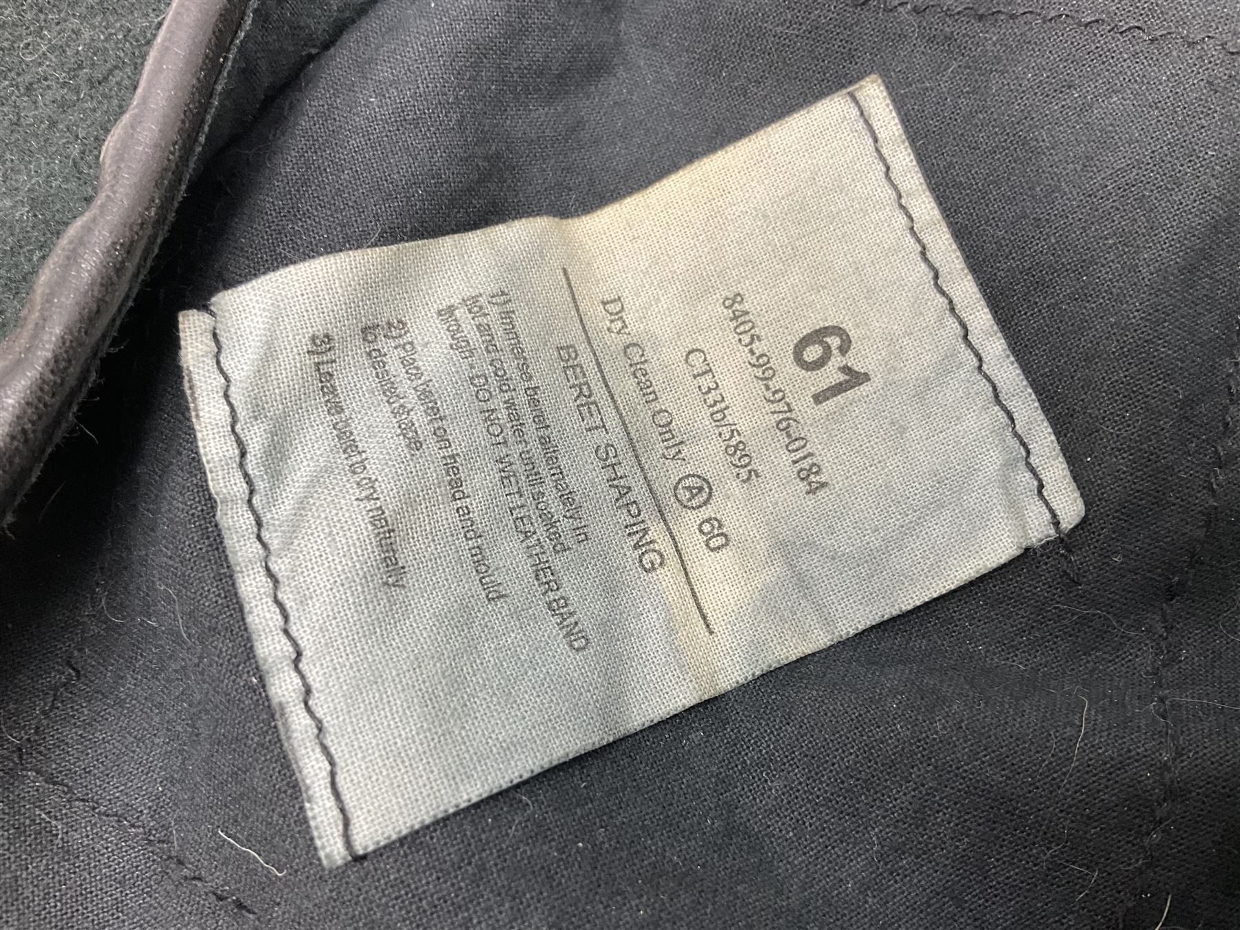 WW1 British Army Derby Scheme 1915 Attested armband; beret with East Yorkshire cap badge; pair of fur lined leather flying/motorcycle goggles; HMS Pembroke cap band; and small quantity of RNAS cloth and metal badges etc