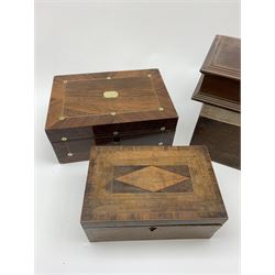 A 19th century rosewood and mother of pearl inlaid box, together with an Edwardian inlaid and cross banded mahogany example, and two further mahogany examples. (4). 