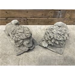 Pair of small recumbent garden lions