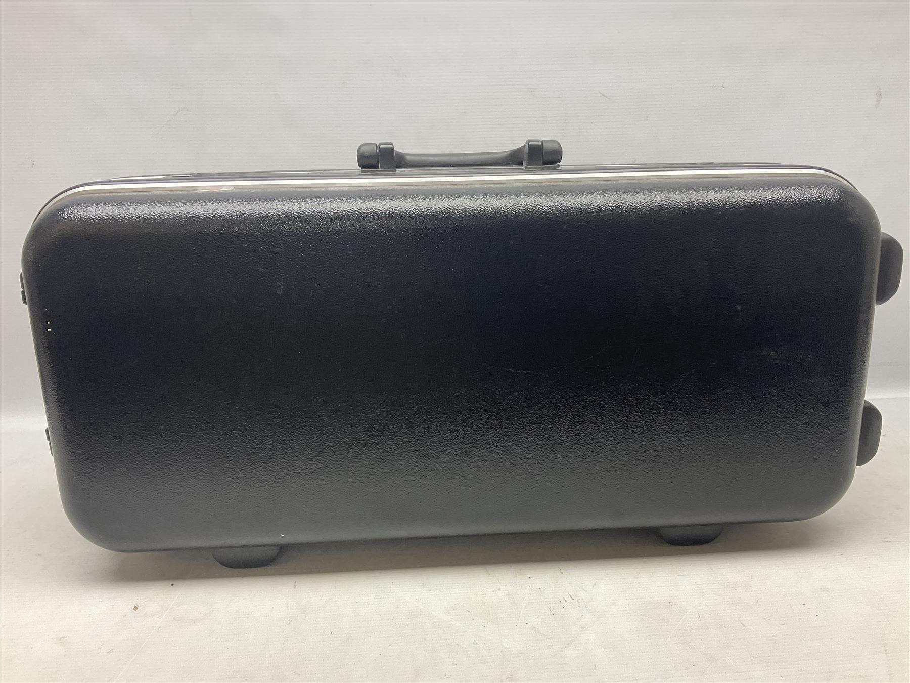 Lacquered brass 'King' alto saxophone inscribed Made by the H.N. White Co.' (Cleveland Ohio) with crook, serial no.84128; also stamped No.1 549 911 and Pat D 8-18-25; in fitted carrying case 