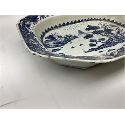 Late 18th/early 19th century Chinese export blue and white dish of canted form, decorated with a waterside landscape set with pagodas and boats between islands within a spearhead and Fitzhugh border, W38cm H28cm