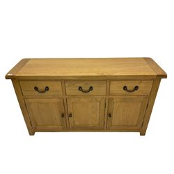 Oak sideboard, fitted with three drawers and three cupboards