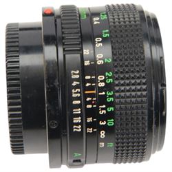 Collection of Canon camera lenses and accessories, including EF 50m 1:1.4 lens, EF 35mm 1:2 lensFD 28mm 1:2.8 lens, FD 50mm 1:1.8 lens, FD 135mm 1:2.5 S.C lens, FD35-70mm 1:3.5-4.5 lens, three Speedlite 550EX flashes, Transistor pack E, lens hoods, battery chargers, etc 