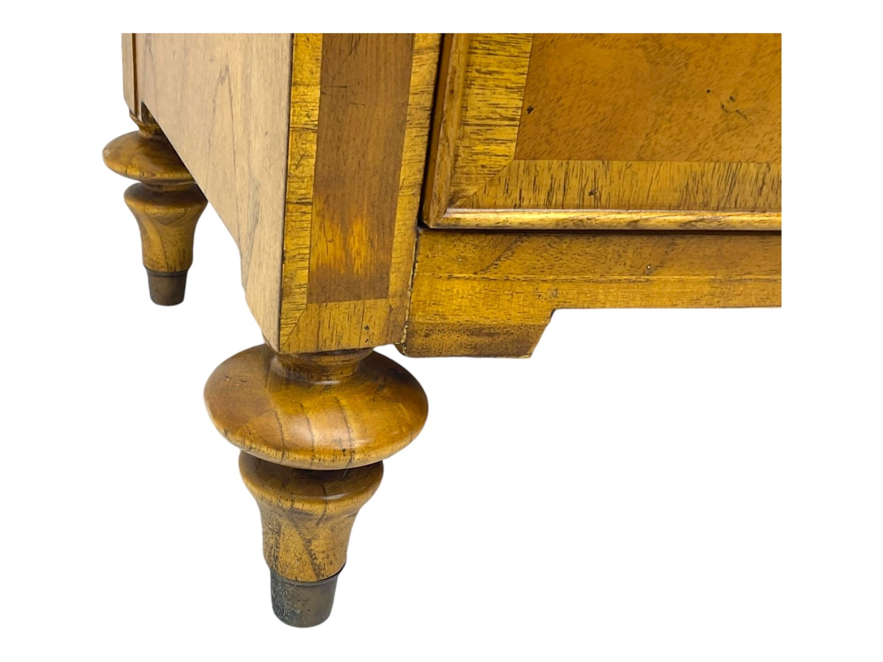 Frank Hudson - mid-20th century Mindi ash and burr walnut 'Spire' bow-fronted chest, featuring a crossbanded top over two short and three long cockbeaded drawers, raised on turned supports  