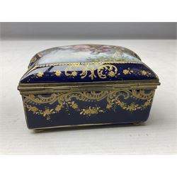 Sevres style late 19th/early 20th century trinket box decorated in the rococo style, the shaped cover painted with an 18th century courting couple in a garden scene opening to reveal the interior painted with floral sprays, the conforming body with a painted panel of floral decoration, all reserved upon cobalt blue ground with foliate gilt borders, with interlaced L's mark beneath, L12cm H6cm