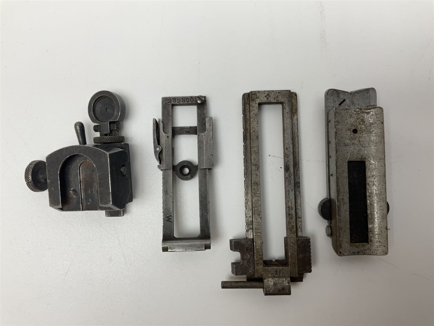Collection of rear sights and mounts etc including Fraser Edinburgh patent pending no.28330, Martini Henry, part Mauser, .303 No.4 etc
