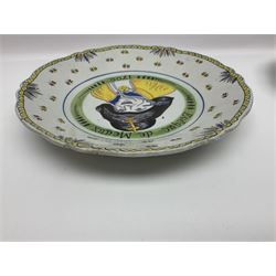 Four French Faience plates, comprising Je suis las de le porter, Le malheur nous reunit, Je desire y arriver and Eveque de Meaux, D24cm  