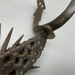 Pair of South American gaucho steel and brass spurs with twenty-two spike heel rowels, possibly Chilean L23cm