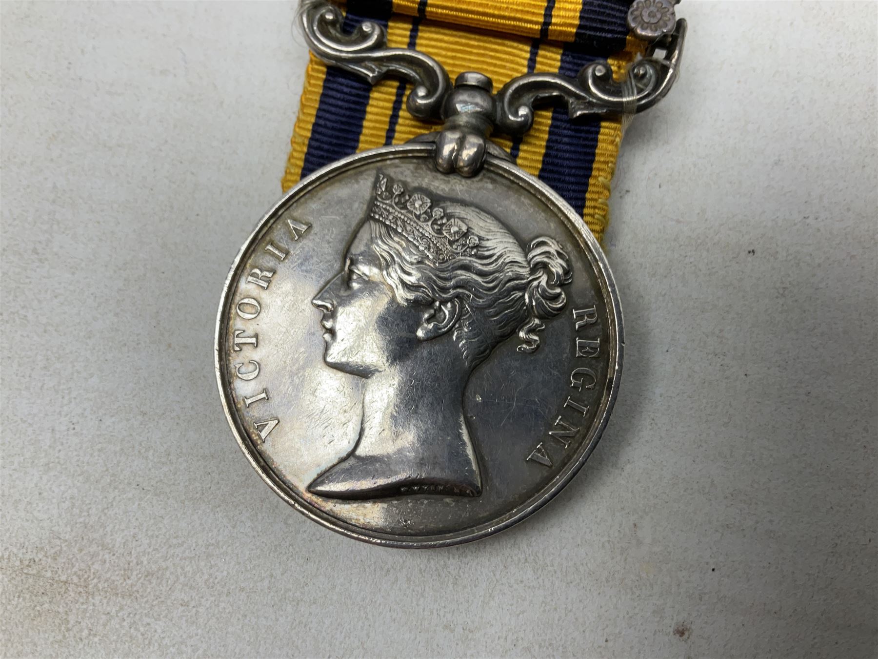 Victoria South Africa (Zulu) Medal with clasp for 1879, awarded to 2112 Pte. T. Cook 1st Dgn. Gds. with card stiffened ribbon