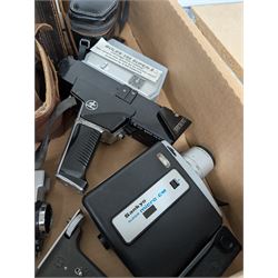 Collection of vintage cine cameras, including Bolex Paillard B8L, Mansfield Holiday Meter Matic, Quarz, Bell & Howell Autoset, Sankyo Super Micro, Canon Demi C, Agfa Movexoom, etc