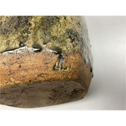 Janet Leach (American, 1918-1997) for Leach Pottery; studio pottery Bizen style vase of tapering form, the stoneware body decorated in a mottled green and brown dripped ash glaze, with impressed J.L. monogram and stamp marks beneath, H30cm