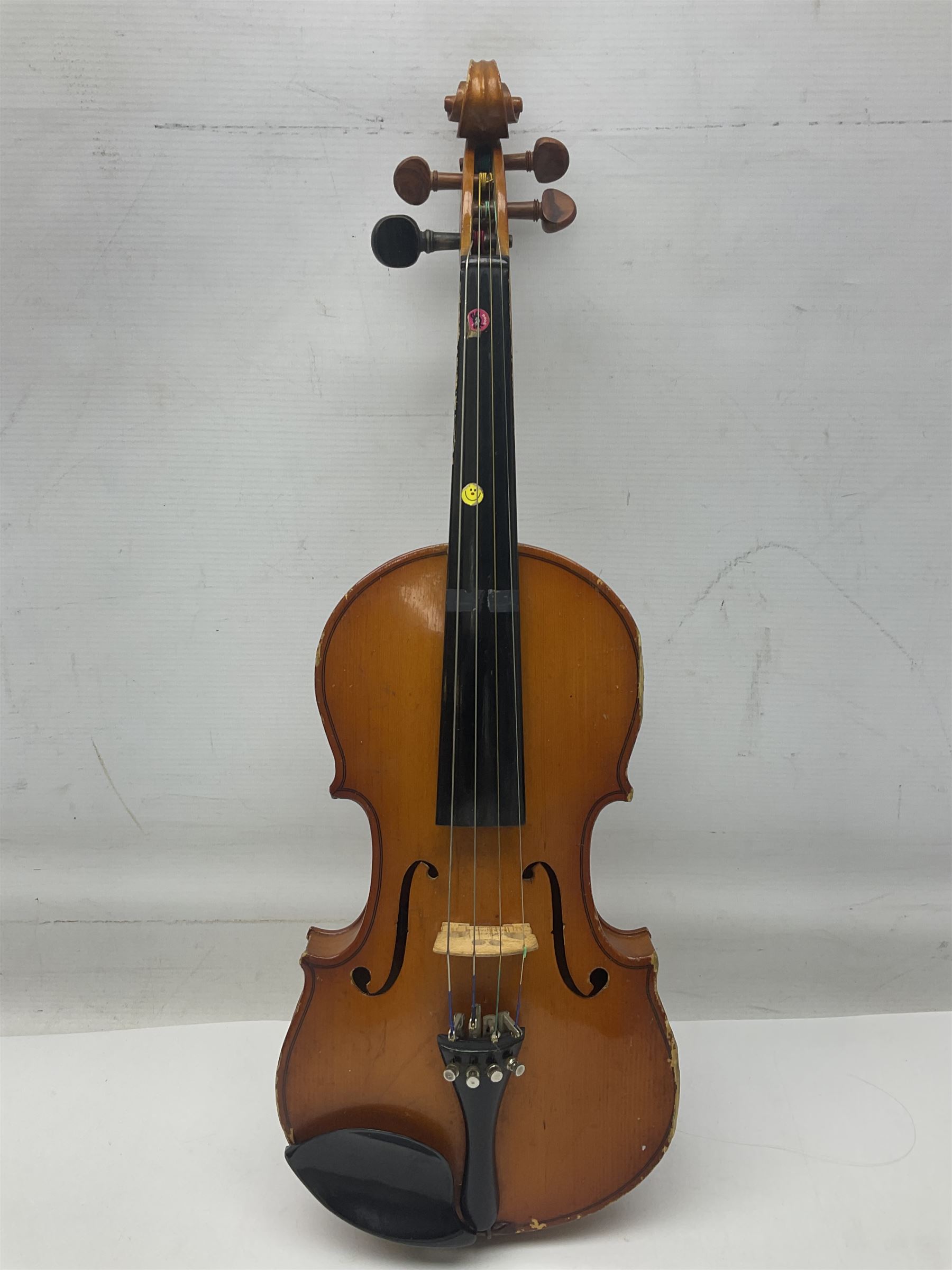 Four Chinese graduated violins - full size with 35.5cm two-piece back; three-quarter size with 33.5cm two-piece back; half size with 31cm two-piece back; and quarter size with 27.5cm two-piece back; all cased except full size; one with bow (4)