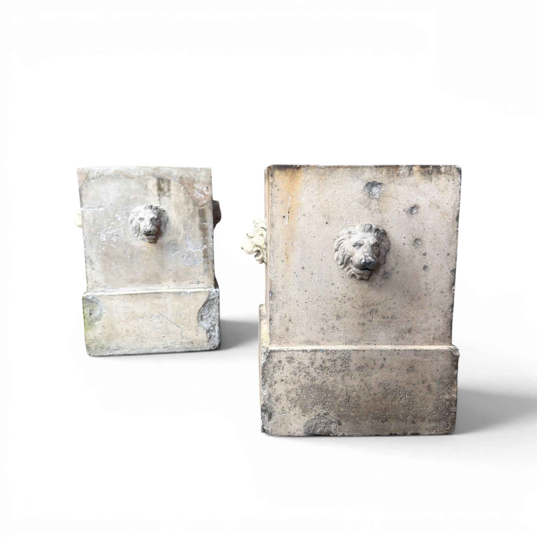 J M Blashfield - pair of 19th century buff terracotta garden urn plinths, square form with stepped base, decorated with relief lion masks