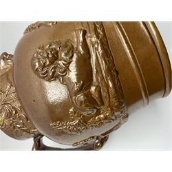 19th century salt glazed stoneware jug, with mask spout and greyhound modelled handle, the body decorated in relief with Royal Coat of Arms flanked by lions, the rim with the flowers of the union, roses, thistles and shamrocks, H26.5cm