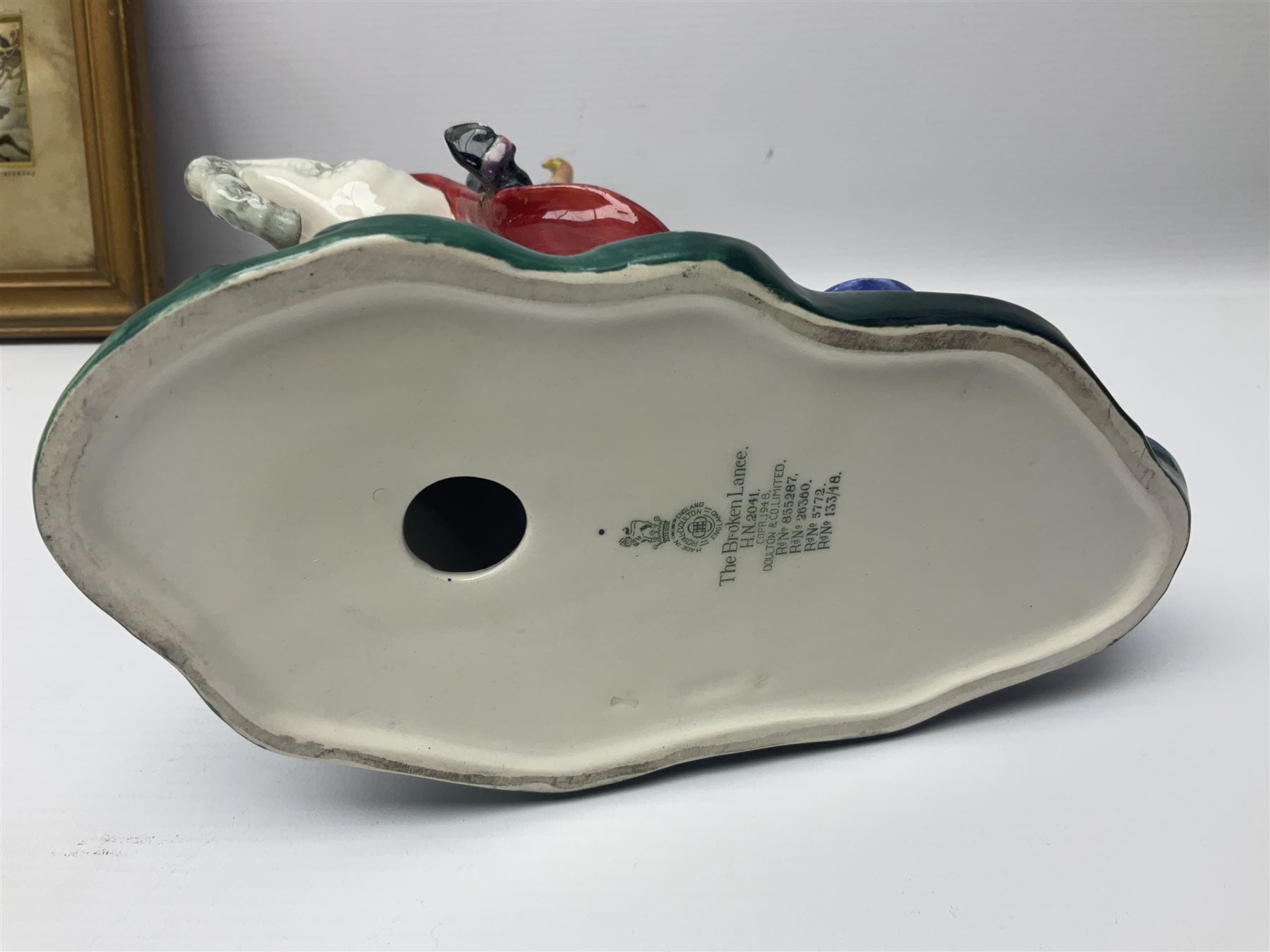 Four Royal Doulton figures, to include The Broken Lance HN 2041, The Old Balloon Seller HN 1315, The Balloon Man HN 11954 and Little Boy Blue HN 2043, together with a Coalport Ladies of Fashion figure Regina and three framed hunting silk needle works