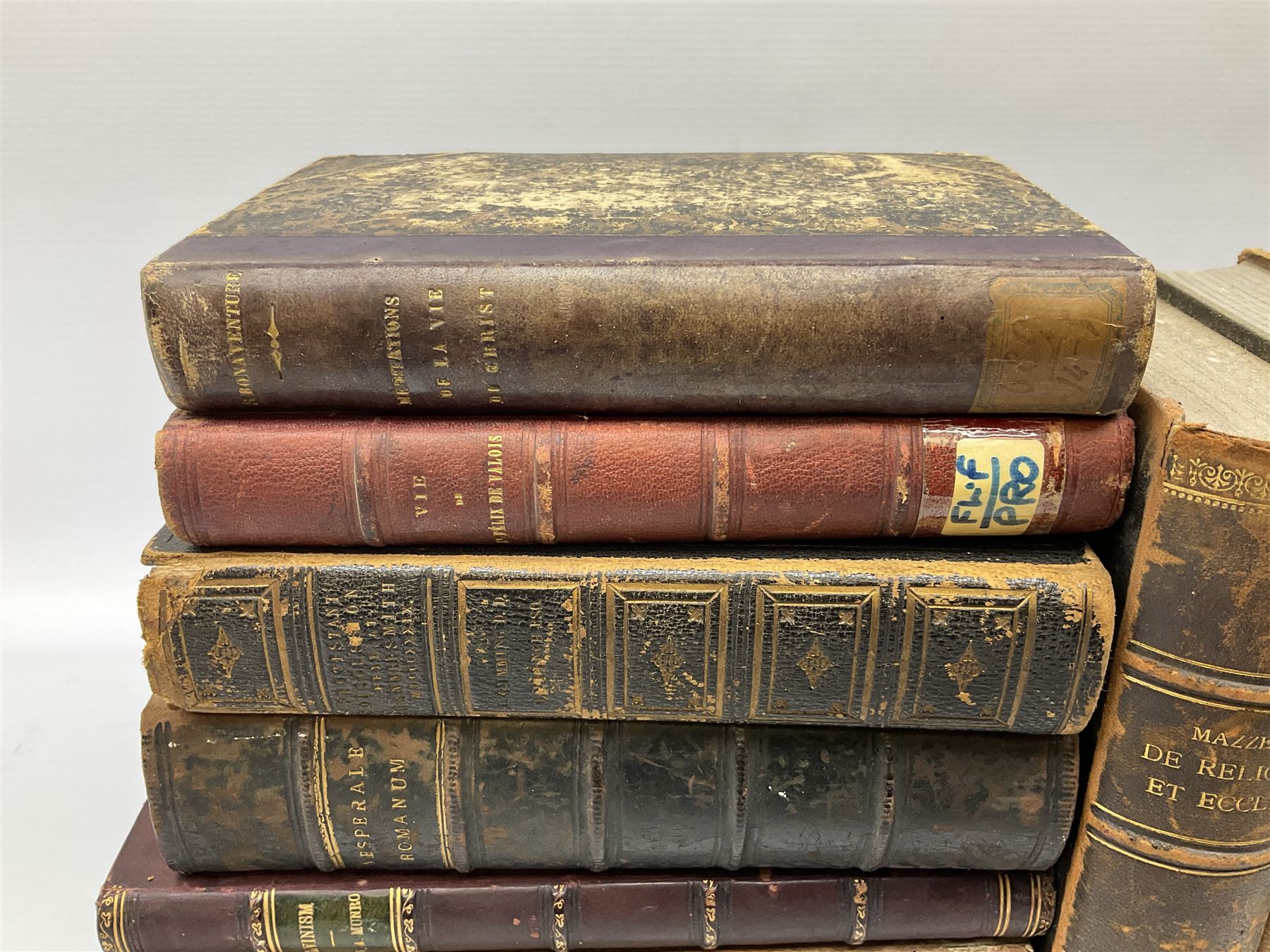 Eighteen 19th century leather bound books including Oeuvres Completes De Voltaire. 1827 Paris. Two volumes; Oeuvres De Pierre Corneille. 1892 Paris; Commentarium in Librum Geneseos Scripsit Thomas Josephus Lamy. 1883 Mechliniae; etc (18)