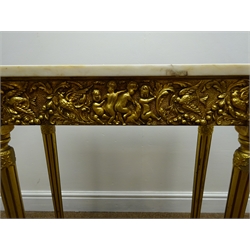  Gilt console table with rectangular marble top, decorated with cherubs and fruit swags, on fluted supports, W61cm, H76cm, D31cm  
